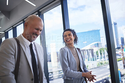Buy stock photo Collaboration, laughing and walking with business people in airport together for international travel. Conversation, funny or teamwork with man and woman employee on bridge in terminal for flight