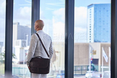 Buy stock photo Businessman, office or back by window for work with bag, justice lawyer with future plan or goal. Male attorney, thinking or planning for growth in law firm by glass, professional in city building