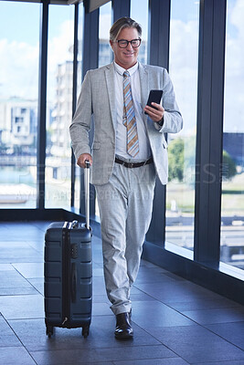 Buy stock photo Business man, travel and phone in airport for communication, networking and check schedule or agenda. Director, corporate and mobile in building for investment, trading and booking of taxi or flight