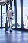 Business man, travel and networking in airport for communication and check schedule or agenda. Company director, walking and mobile in building for investment, trading and online weather update
