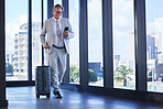 Businessman, travel and communication with phone in airport for networking and check schedule. Company director, walking and mobile in building for investment, trading and online weather update