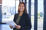 Woman, portrait and reading paperwork in office for budget planning, finance portfolio and payment loan. Happy, female person and document for review, report and legal asset management of application