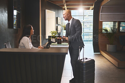 Buy stock photo Receptionist, people and man in hotel with check in for accommodation on business trip. Woman, employee and male client or customer with smile in help desk for booking and hospitality as guest