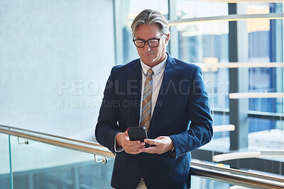 Buy stock photo Cellphone, communication and businessman in office for email for corporate networking with client. Phone, reading and mature male finance executive with online company revenue report in workplace.