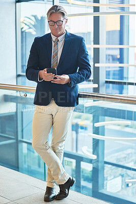 Buy stock photo Phone, connection and businessman in office for email for corporate communication with client. Cellphone, reading and mature male finance executive with online company revenue report in workplace.