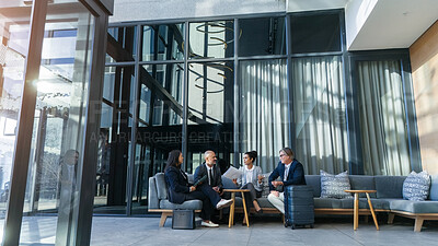 Buy stock photo Business travel, meeting and people on couch in airport, terminal lounge and lobby with professional employees. Entrepreneurs, luggage and collaboration for b2b trip, work convention and diversity