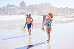 Holiday, kids and parents on beach with pointing, fun or bonding together on outdoor tropical adventure. Mom, dad and children on summer island vacation with ocean, happy family and support on travel