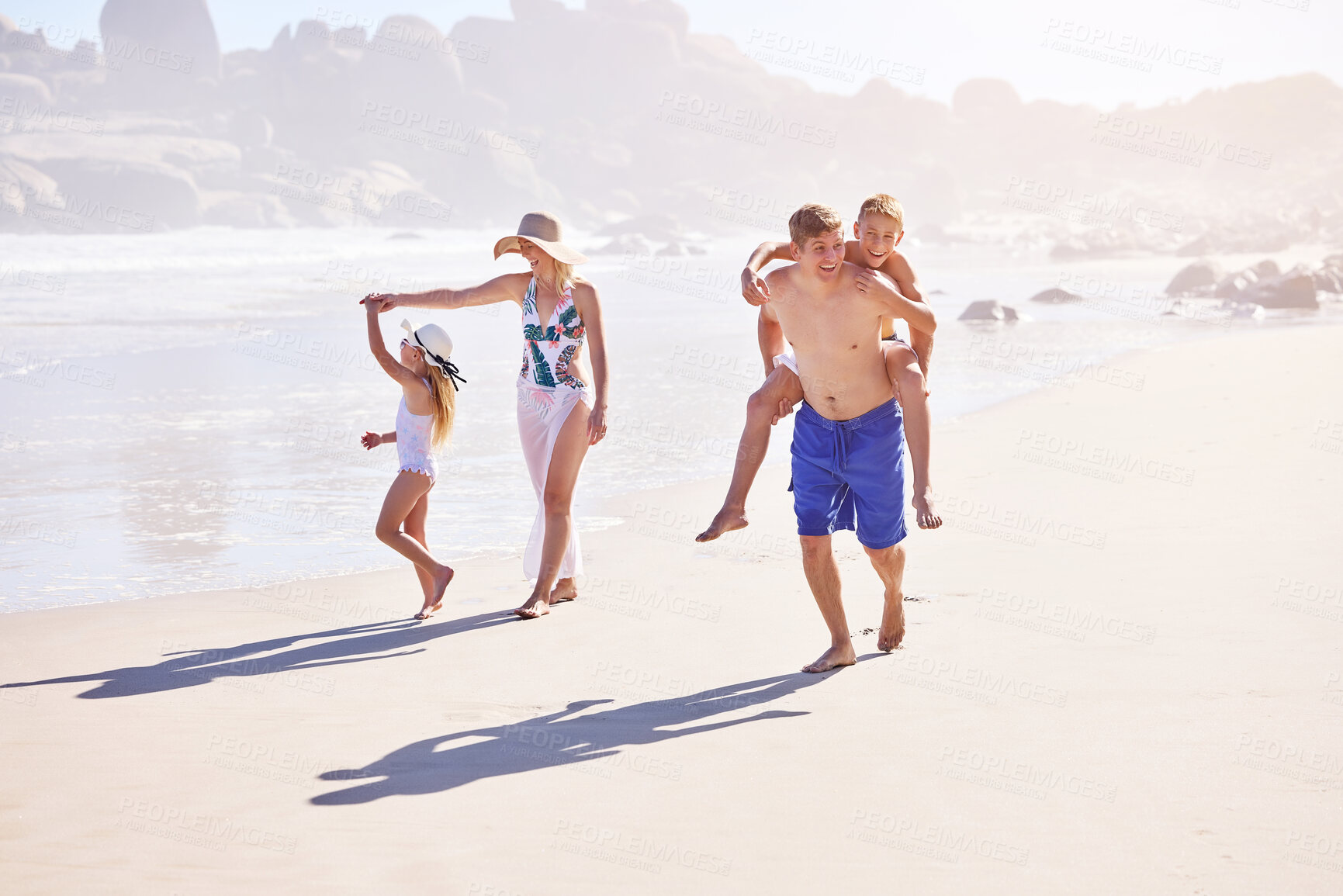 Buy stock photo Ocean, kids and parents on walking on holiday with fun, bonding and outdoor travel adventure together. Mom, dad and children on summer vacation with beach, water and happy family on tropical island