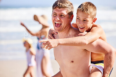 Buy stock photo Holiday, kid and dad on beach with pointing, piggy back and bonding together on outdoor tropical adventure. Smile, father and son on summer island vacation with ocean, happy family and fun on travel