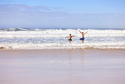 Buy stock photo Waves, kid and dad jump on beach with fun, travel and bonding together on tropical holiday adventure. Island, father and son running on summer vacation with ocean, happy play and sea water from back