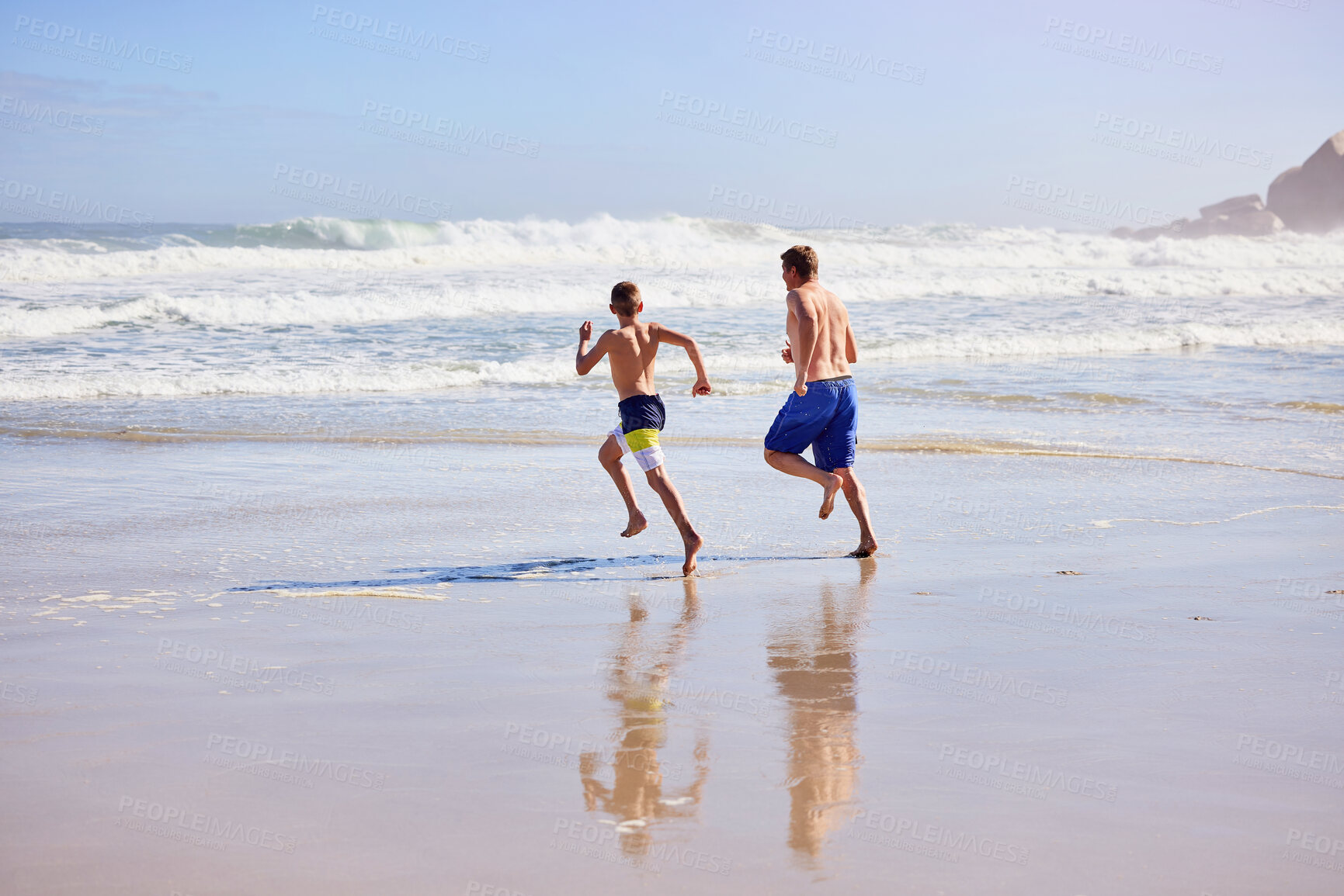 Buy stock photo Water, kid and dad running on beach with fun, travel and bonding together on tropical holiday adventure. Waves, father and son play on summer island vacation with ocean, outdoor race and happy family