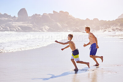 Buy stock photo Waves, child and dad running on beach with fun, travel and bonding together on tropical holiday adventure. Water, father and son play on summer island vacation with ocean, outdoor race and happy kid