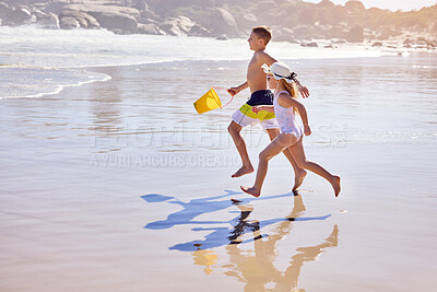 Buy stock photo Children, beach or running with bucket for playing in water with fun activity, summer holiday or race game. Kids, siblings or swimwear on sand with tropical adventure, family vacation or plastic toys