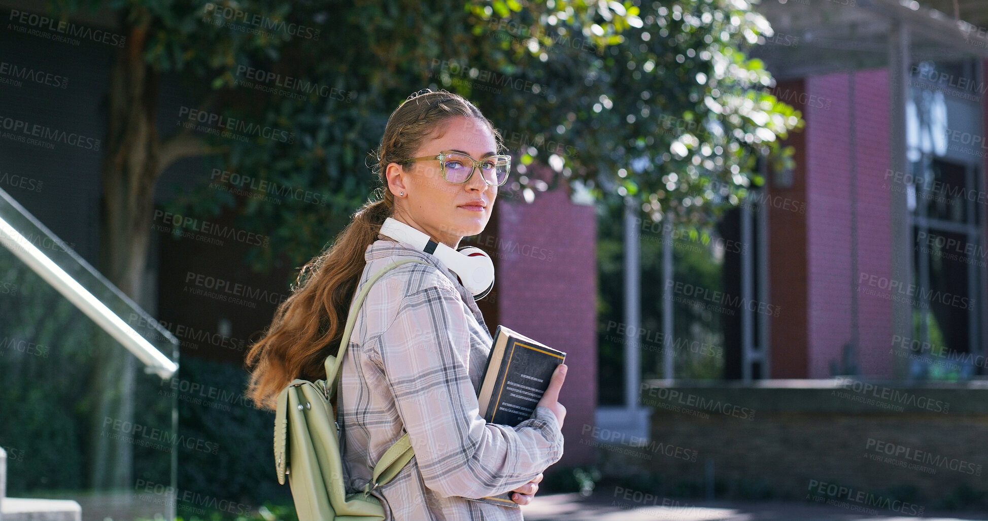 Buy stock photo Portrait of girl, morning or college student walking to class for learning, future or study in university campus. Travel, gen z or woman with book or opportunity for school, education or scholarship