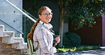 Portrait of happy woman, commute or college student walking to class for learning or study in university campus. Travel, gen z or girl with book or opportunity for school, education or scholarship