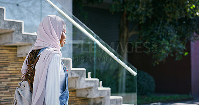 Buy stock photo University, campus and Islamic woman with backpack, walking and study opportunity in education. Muslim, culture and happy college student in hijab on outdoor morning commute for learning at school