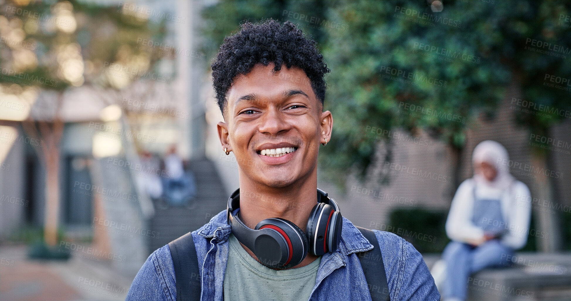 Buy stock photo Student, smile and portrait at college for education, excited and pride for academic achievement. Man, happy and headphones on campus for knowledge, development and university scholarship opportunity