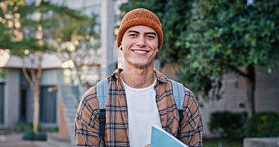 Buy stock photo University, student and man in portrait outdoor on campus with book for education, learning and scholarship. Gen z, person and happy at college for studying, knowledge or backpack for research in USA