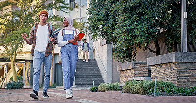 Buy stock photo Muslim, friends or students walking in college to class for learning, future or studying in university. Diversity, outdoor or young people with book or knowledge for school, education or scholarship