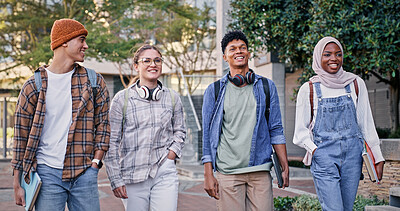 Buy stock photo Students, speaking and walking to university lesson, talking and share knowledge on module. People, friends and outside for group project discussion, study and together for trip to college class