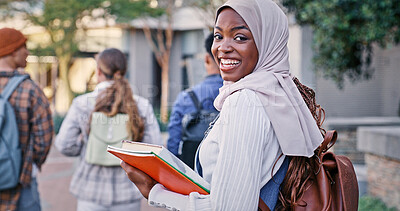 Buy stock photo University, student and girl in portrait outdoor on campus with book for education, learning and scholarship. African, woman or walking at college for study, knowledge or backpack for research in USA