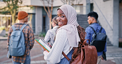 Buy stock photo University, student and muslim girl in portrait outdoor on campus with books for education, learning or scholarship. African, woman or walking at college for study, knowledge or backpack for research