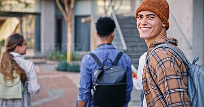 Buy stock photo College, student and man in portrait outdoor on campus with book for education, learning and scholarship. Gen z, person or walking at university for studying, knowledge and backpack for exam research