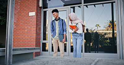Buy stock photo Man, woman and university student with laughing, outdoor and conversation with funny joke by front door. People, friends and happy memory with backpack, books and learning with education at college