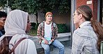 University, students and relax outdoor on campus with college talk, conversation and happy for education. Friends, circle and people with learning, break and study group for scholarship and knowledge