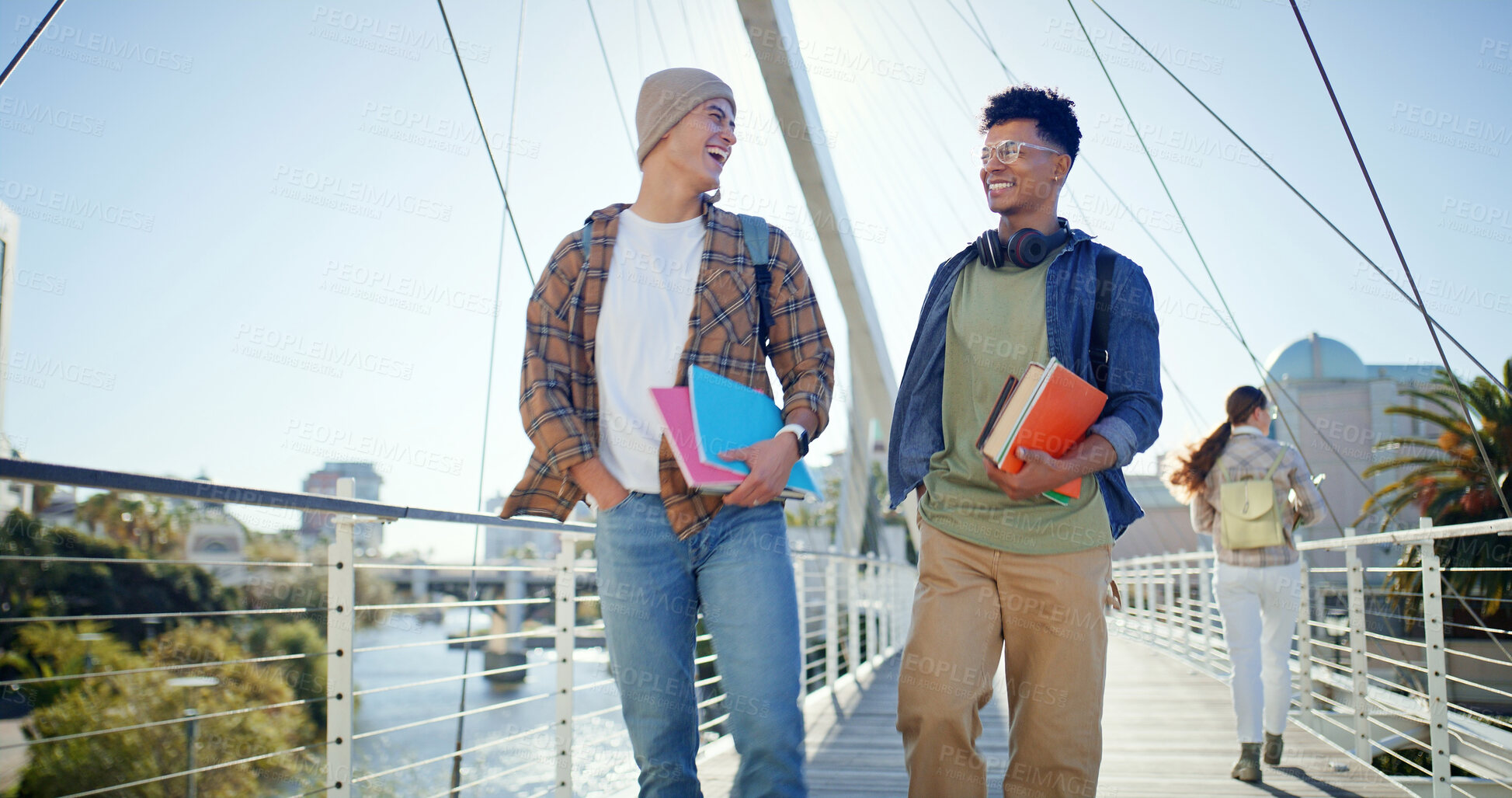 Buy stock photo University, men and walking on outdoor bridge with student notebook, laugh and chat at college. Happy, discussion and morning with textbook, youth and education of friends in New York with learning