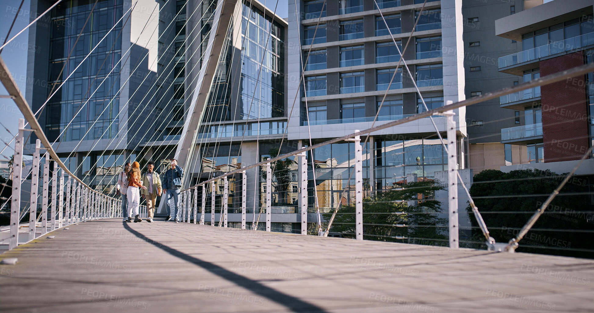 Buy stock photo City, people and bridge with buildings, sunshine and walking with break, start day and tourism. Urban town, New York and outdoor with group, fresh air and morning with architecture and engineering