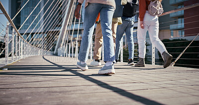 Buy stock photo Feet, college and friends with people and walking for education, learning and knowledge. University, academy and youth development with students on campus for scholarship, school and studying