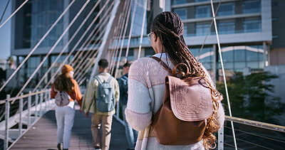 Buy stock photo Student, learning and walking with back of woman for education, future and knowledge. University, academy and youth development with person at college campus for scholarship, school and studying