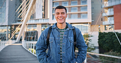 Buy stock photo Man, student and portrait at college for education, learning and happy for academic opportunity. Learner, smile and pride at university for scholarship, exchange programme and commitment in Portugal