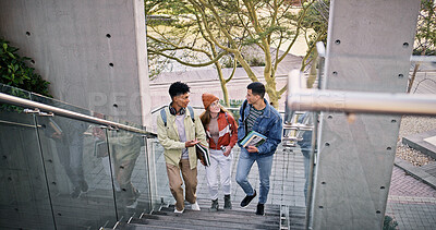 Buy stock photo Conversation, study and walking with friends on stairs at college or university campus for learning. Development, education or growth with man and woman students outdoor at school together for future