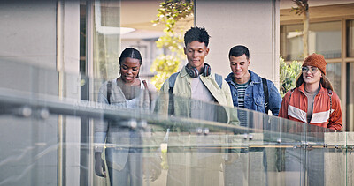 Buy stock photo Students, walking and chat at university for education, new semester and ready for learning. People, friends and talking on campus for catch up, gossip and social with diversity in community college