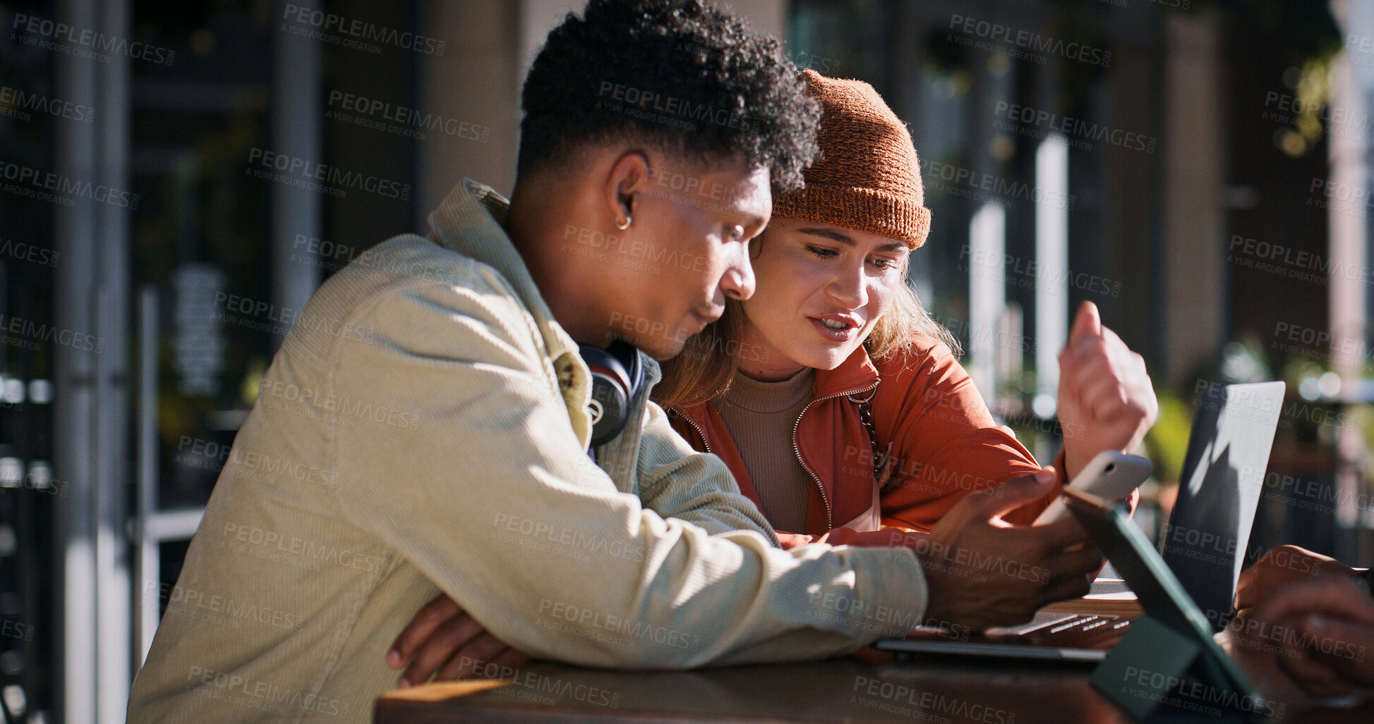 Buy stock photo Education, laptop and phone with student friends on campus together for learning or study. College, technology or university with man and woman learner outdoor together for development or growth