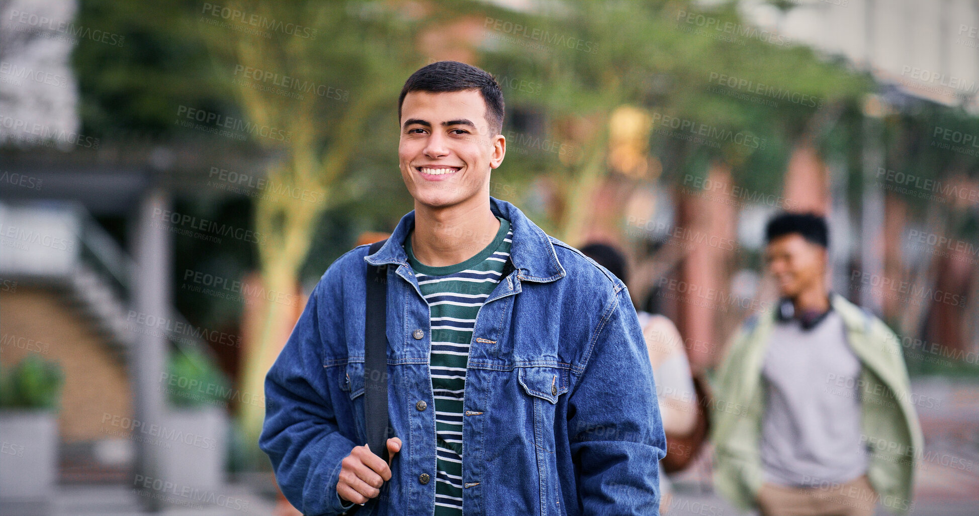 Buy stock photo Knowledge, university and student on park walk for scholarship, education and future goals with portrait smile. Happy man, college or academy campus for learning, commute and pride with satisfaction