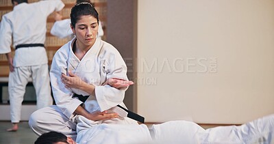 Buy stock photo Karate, martial arts and self defense with people in dojo for demonstration, fitness or training. Challenge, grappling or technique with Sensei and student in Japan for combat, fighting or sports