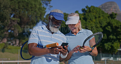Buy stock photo Happy, elderly people and phone on court for tennis, social media and fun with sports bloopers. Interracial couple, seniors and outdoor with mobile for entertainment, fitness app or tracking progress