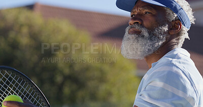 Buy stock photo Fitness, sport and mature man with racket, serious and playing of game for exercise, healthy and active. Outdoor, training and black person with equipment for workout, athlete or confident for tennis