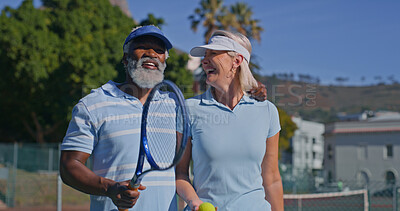 Buy stock photo Tennis court, interracial couple and mature people laugh for fitness, game joke or competition. Training, racket and funny man with woman for match, workout and weekend hobby for health and wellness