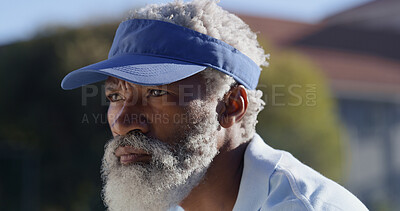 Buy stock photo Tennis, court and face of mature black man with morning game, serious challenge or outdoor competition. Professional athlete, player or person with weekend hobby, fitness and health at sports club