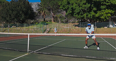 Buy stock photo Exercise, sport and mature people with racket, performance and playing of game for fitness, healthy and active. Outdoor, training and athlete with equipment for workout, match or confident for tennis