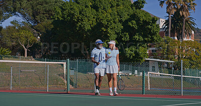 Buy stock photo Tennis court, couple and interracial people for match, game or competition. Fitness, sports racket and mature athlete man with woman for training, workout and weekend hobby for health and wellness