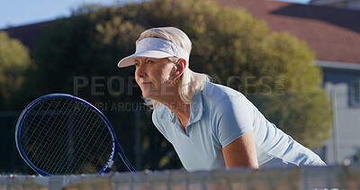 Buy stock photo Tennis, serve and start with senior woman on court for sports tournament, competition and game. Training, exercise and championship with elderly person in outdoors for athlete, fitness and event