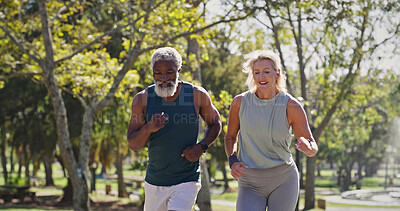 Buy stock photo Fitness, elderly people and running in park for wellness, cardio exercise and training in retirement. Interracial couple, senior and outdoor for workout with support, racing and friends with energy