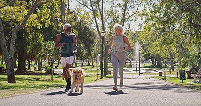 Buy stock photo Park, couple and smile for running with dog for fitness, exercise and workout for health as lovers. Outdoor, happy and mature interracial people with pet or animal for support, care and bonding