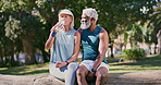 Water, park and mature couple on break, fitness and relax in summer, exercise and bonding of people. Drinking, hydration and woman with bottle for thirst, love and date with man, outdoor and healthy