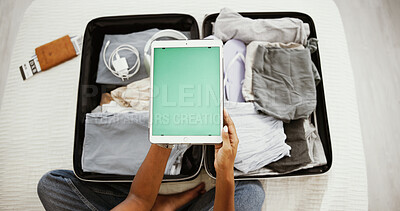 Buy stock photo Person, hands or tablet screen with mockup or suitcase for planning vacation, holiday or travel above at home. Top view, tourist and technology with display or luggage for online browsing or getaway